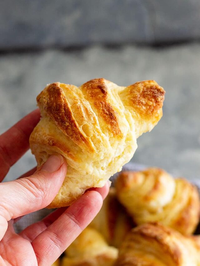 These tender and flaky homemade Crescent Rolls are perfect for your holiday meals!! They are much easier to make than croissants and so buttery! #homemaderolls #crescentrolls