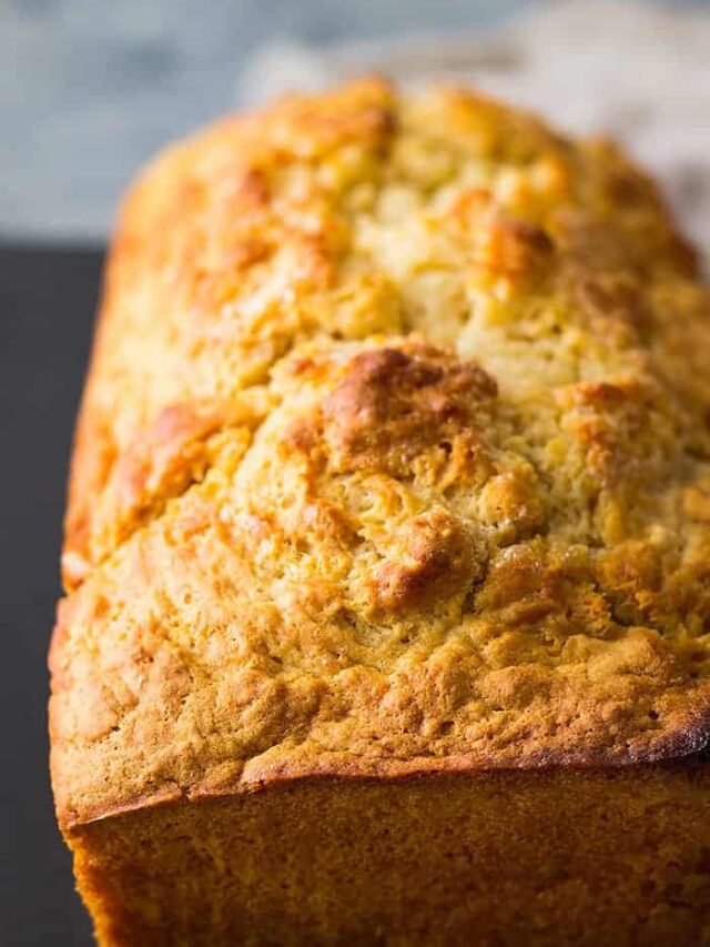Beer Bread is a simple quick bread that is flavored with beer. It's really easy to make and goes great with any meal!