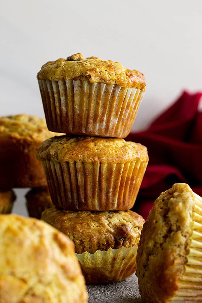 Muffins stacked on top of one another. 