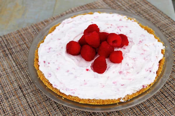 a full Frozen Raspberry Cheesecake Pie in a pie dish 