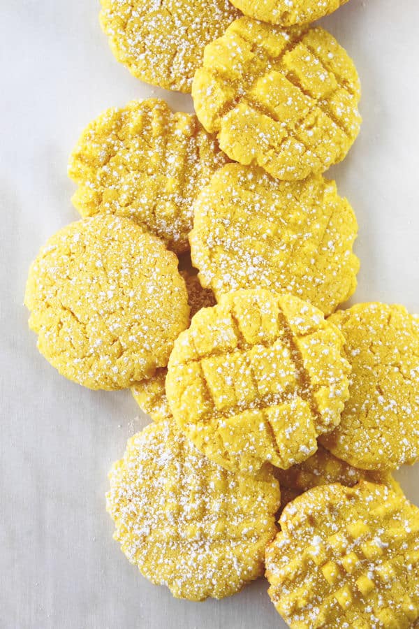 Lemon cake mix cookies with powdered sugar sprinkled on top