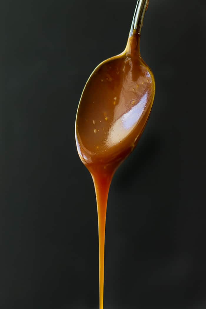 This super easy Salted Caramel Sauce has a lot more flavor than the store bought! It has tons of uses. Try replacing it in your dessert recipes and I know you'll be amazed at the difference! 