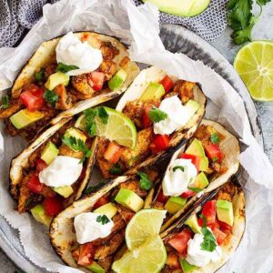 Spicy Chicken Tacos -are a quick and easy weeknight meal! They take less than 30 minutes to make, have clean ingredients, and can please the whole family!