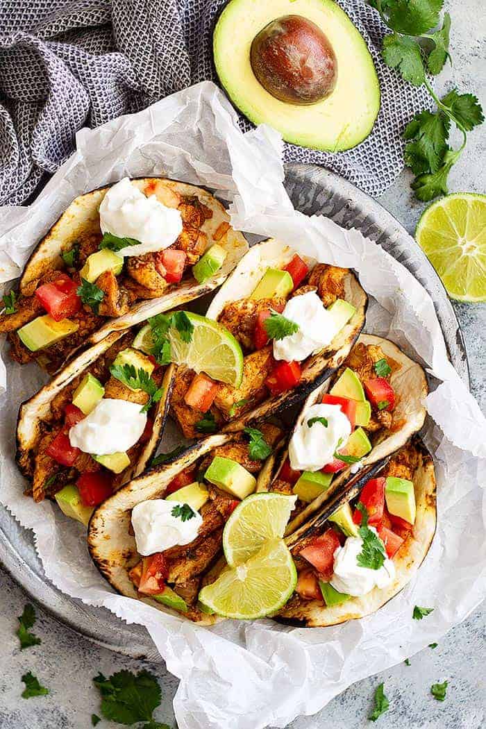 Spicy Chicken Tacos -are a quick and easy weeknight meal! They take less than 30 minutes to make, have clean ingredients, and can please the whole family!