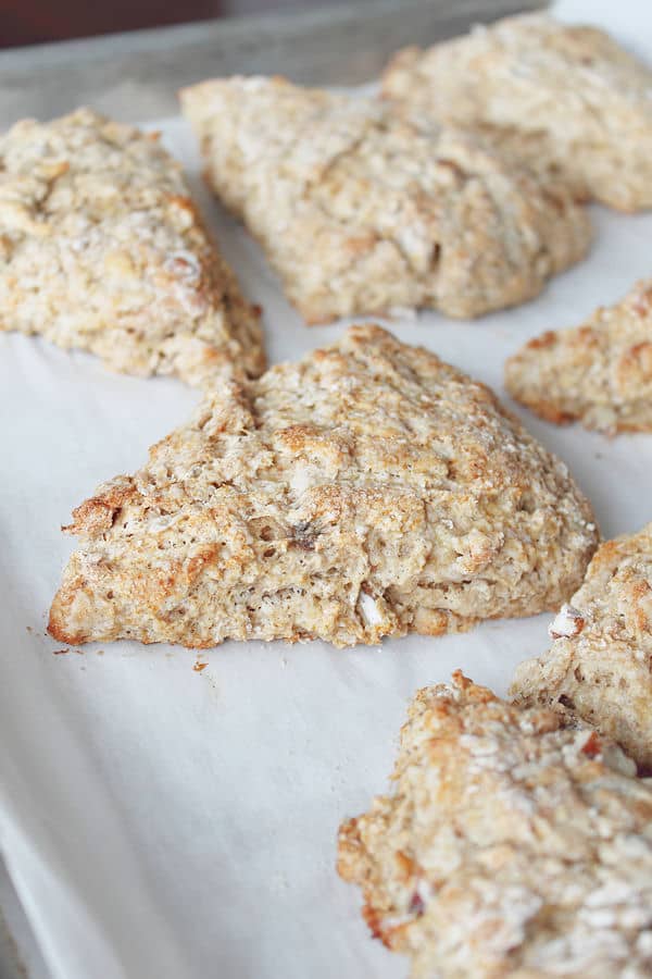 a baking sheet of Banana Pecan Scones on parchment paper