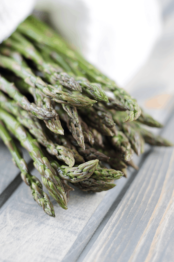 a bundle of fresh asparagus spears to make a strata recipe