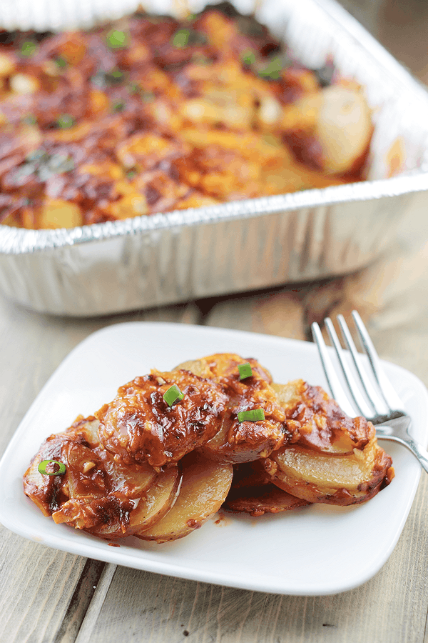 These Cheddar Bacon Potatoes are and easy side dish with smokey bacon and bbq flavor.  | Countryside Cravings