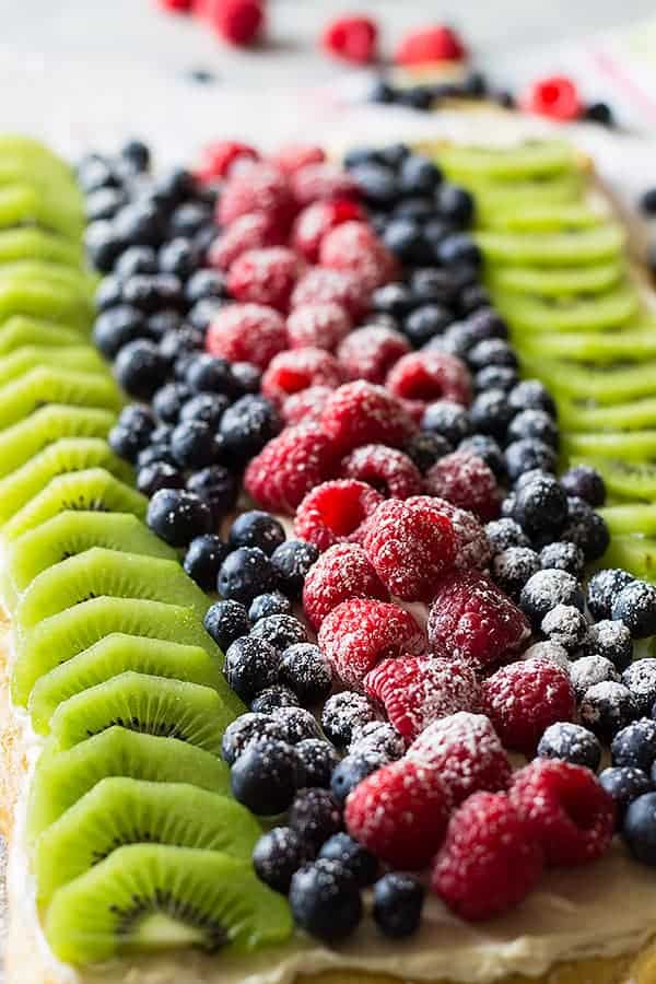 This Easy Fruit Pizza makes a great appetizer or dessert. It's quick and simple and filled with delicious fruit!