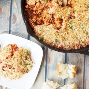 This Chicken Parmesan Pasta Skillet is an easy one pot meal that has all the flavors of chicken Parmesan, just minus the extra work! | Countryside Cravings