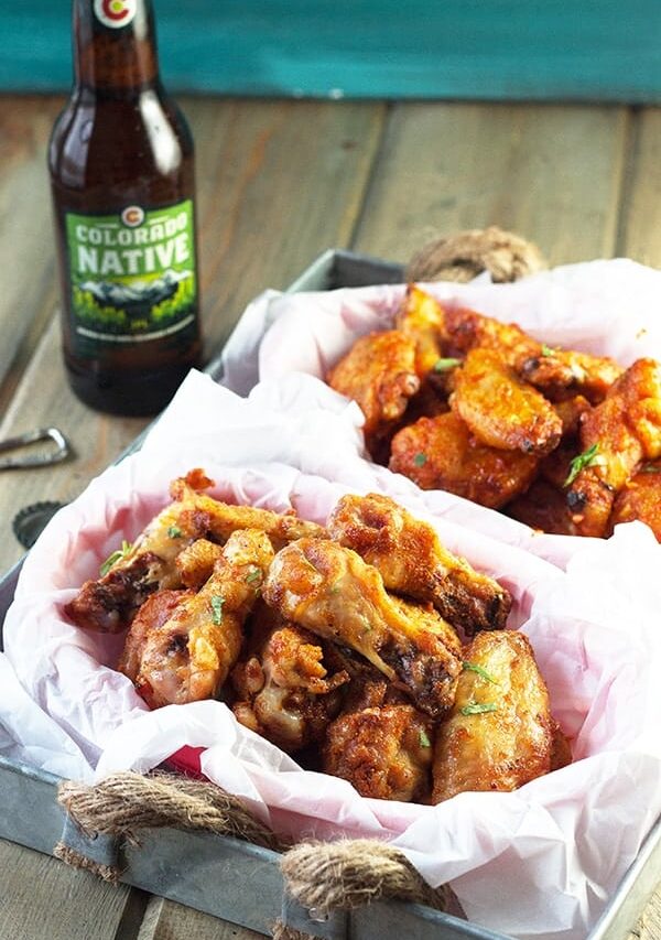 Baked Garlic Sriracha Wings- these wings are baked to crispy perfection then either coated in a garlic sriracha dry rub or sauce! | countrysidecravings.com