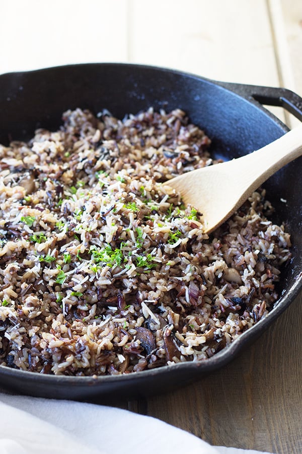 Cheesy Wild Rice with Mushrooms- this is a great fall side dish full of flavor from Parmesan cheese, wild rice cooked in chicken broth and super tasty sauted mushrooms! | countrysidecravings.com