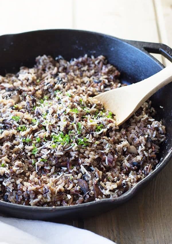 Cheesy Wild Rice with Mushrooms- this is a great fall side dish full of flavor from Parmesan cheese, wild rice cooked in chicken broth and super tasty sauted mushrooms! | countrysidecravings.com