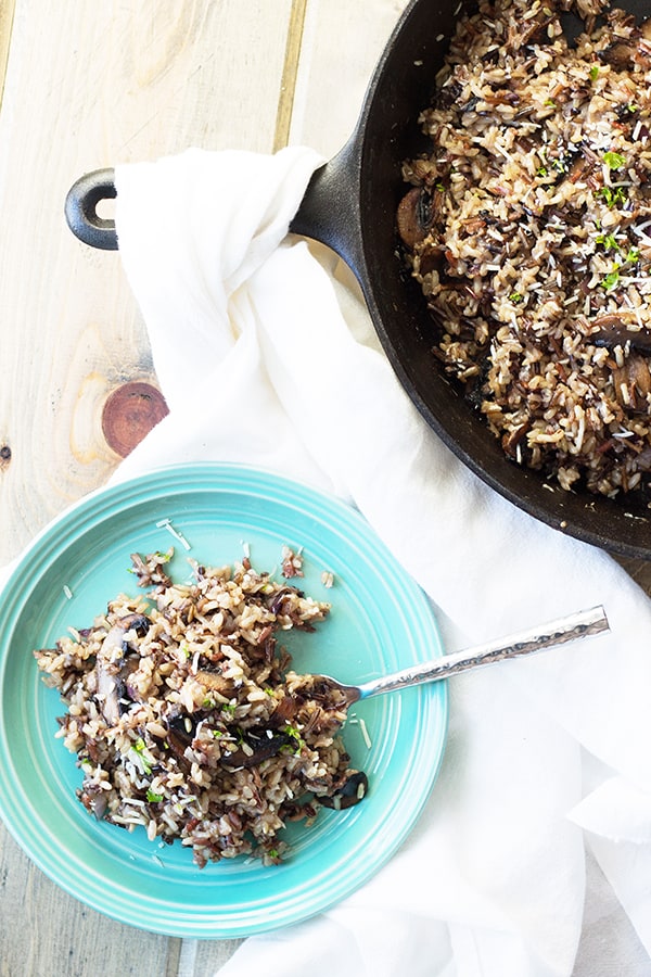 Cheesy Wild Rice with Mushrooms- this is a great fall side dish full of flavor from Parmesan cheese, wild rice cooked in chicken broth and super tasty sauted mushrooms! | countrysidecravings.com