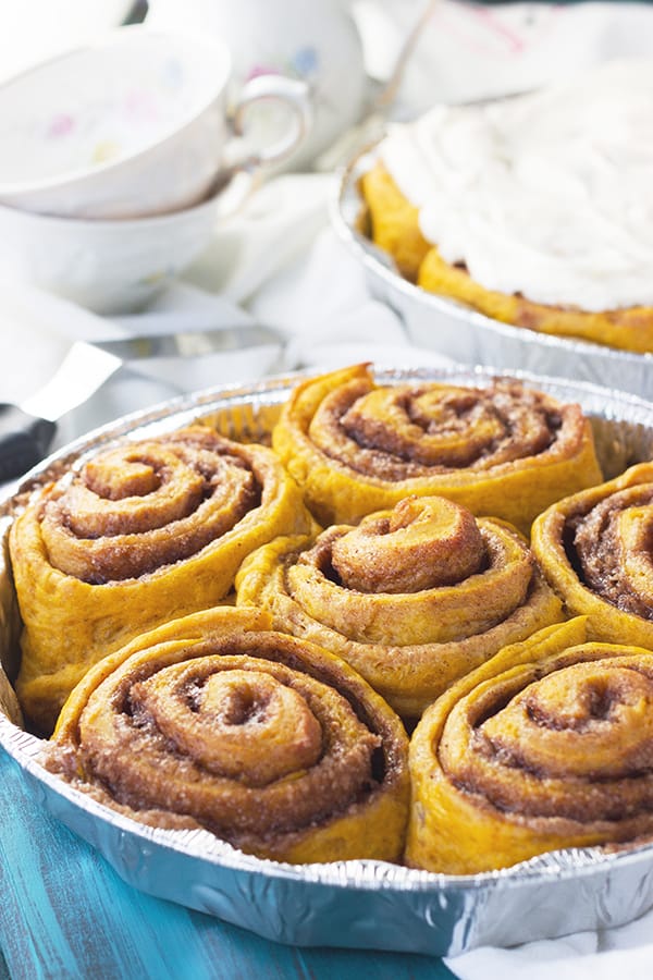 Pumpkin Cinnamon Rolls- a great way to enjoy your morning with these cinnamon rolls packed with pumpkin and spice and topped with a thick creamy layer of cream cheese frosting. | countrysidecravings.com
