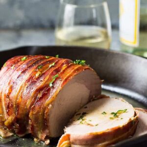 This Bacon Wrapped Pork Loin is easy enough for a weeknight meal but impressive enough to serve to special guests!