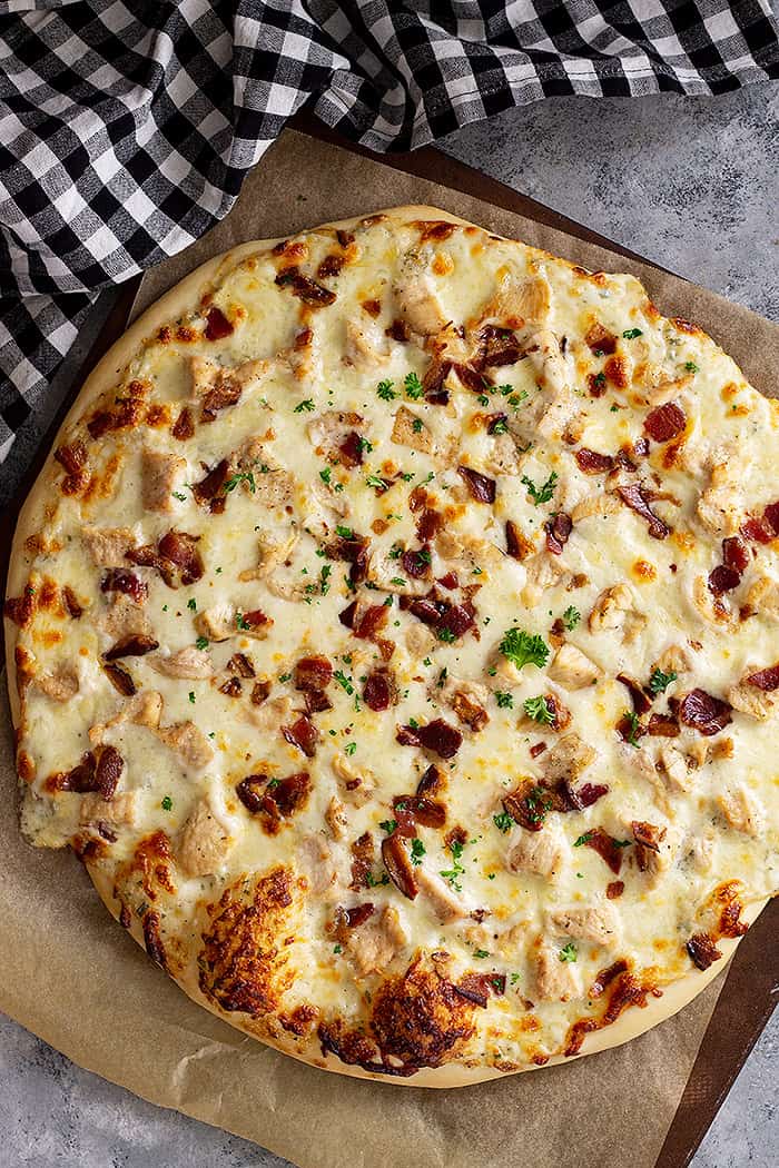 Top down view of Chicken Bacon Ranch Pizza fresh from the oven.