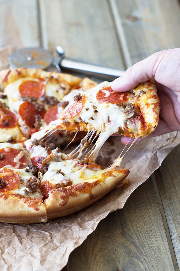 Deep Dish Three Meat Pizza -thick crust, sauce, three kinds of meat and lots of cheese!!! Need I say more?!?! | countrysidecravings.com