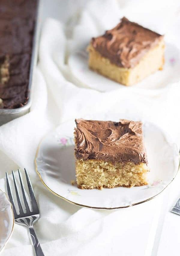 Peanut Butter Cake with Chocolate Frosting- this is an easy cake that is full of peanut butter flavor and topped with a rich and creamy chocolate frosting! | countrysidecravings.com
