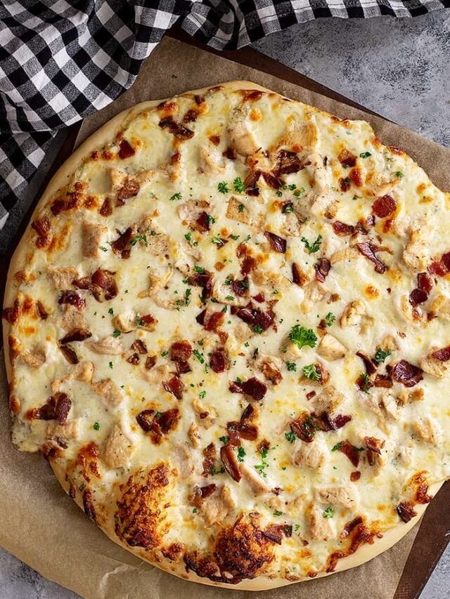 Top down view of Chicken Bacon Ranch Pizza fresh from the oven.