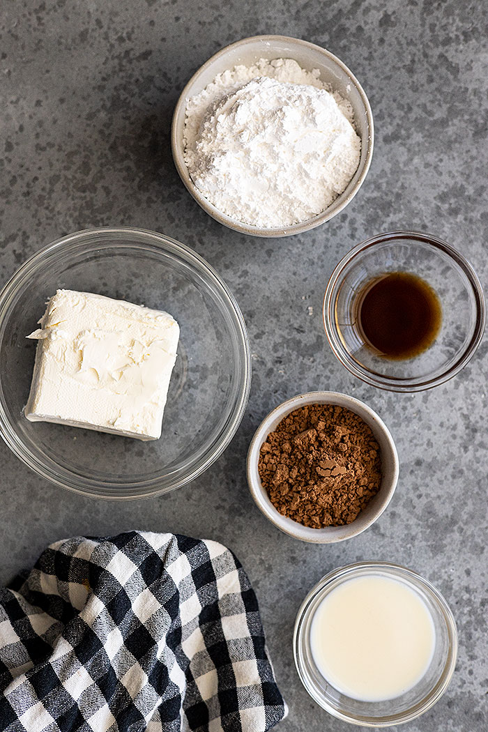 Overhead view of ingredients needed to make chocolate cream cheese fruit dip.