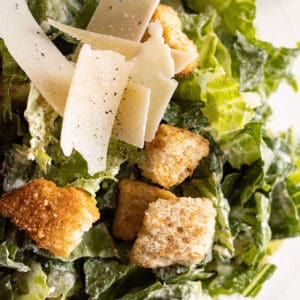 Close up of Easy Caesar Salad with croutons and parmesan.