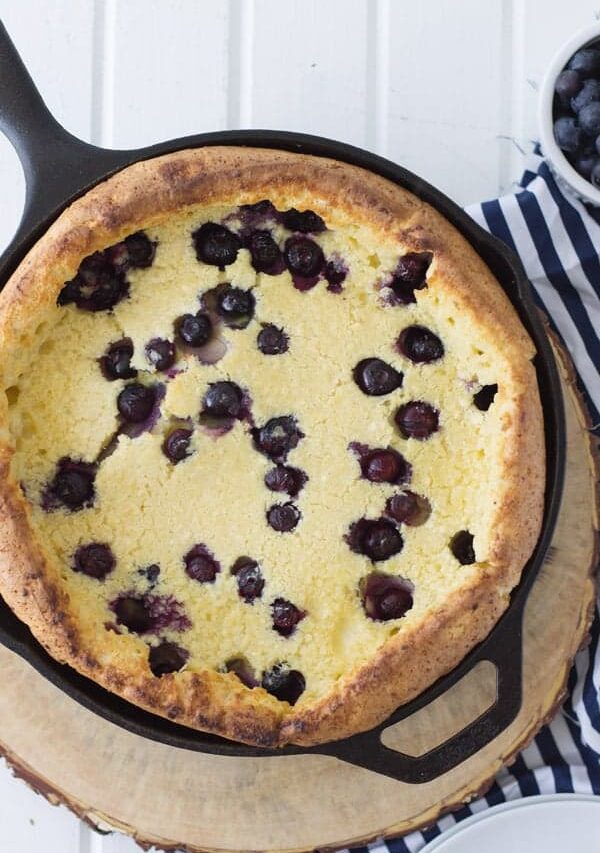 Blueberry Dutch Baby with Lemon Curd is an impressive yet very simple breakfast for any occasion! And topped with lemon curd just sends it over the top!! | www.countrysidecravings.com