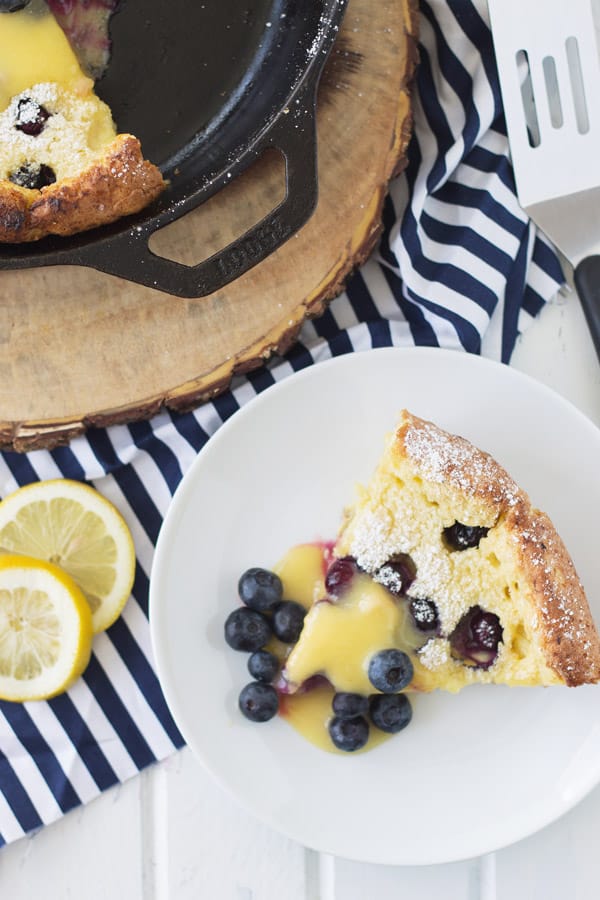 Blueberry Dutch Baby with Lemon Curd is an impressive yet very simple breakfast for any occasion! And topped with lemon curd just sends it over the top!! | www.countrysidecravings.com