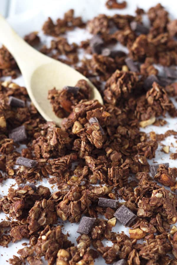 Chocolate Peanut Butter Granola that is super easy to make, great for snacking and it makes huge clusters!! | www.countrysidecravings.com