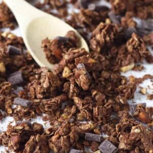 Chocolate Peanut Butter Granola that is super easy to make, great for snacking and it makes huge clusters!! | www.countrysidecravings.com