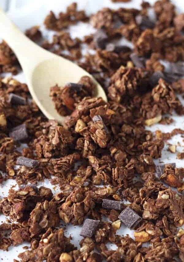 Chocolate Peanut Butter Granola that is super easy to make, great for snacking and it makes huge clusters!! | www.countrysidecravings.com