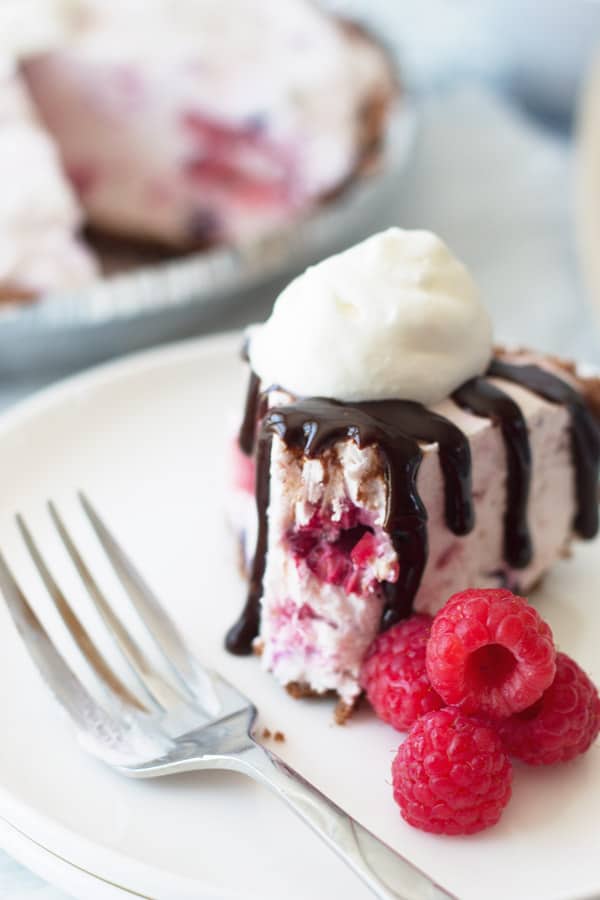 easy to make frozen triple berry cheesecake full of fruity and creamy flavors
