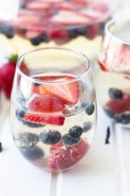Easy White Sangria -an excellent summer time drink full of luscious fruit, crisp white wine and lemon lime soda to make it bubbly! | www.countrysidecravings.com