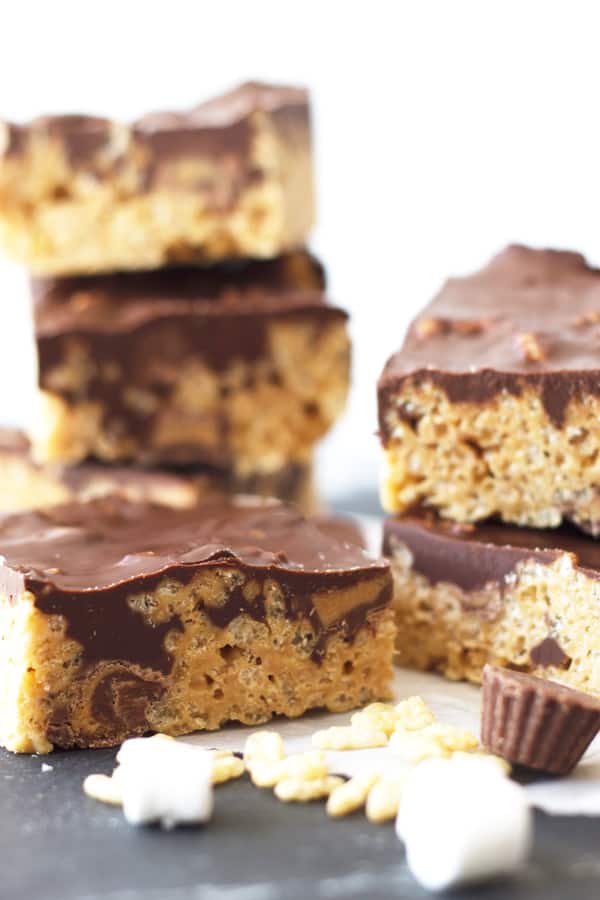 peanut butter rice krispie treats with a chocolate and peanut butter top layer