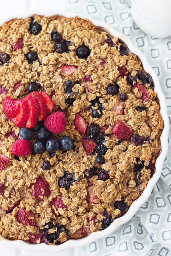 Triple Berry Baked Oatmeal is an easy and healthy way to start off the day. Full of fresh fruit and heart healthy oats! | www.countrysidecravings.com