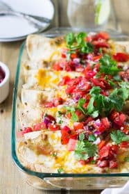 Breakfast Enchiladas are filled with scrambled eggs, sausage, green chilies and cheese! Perfect for weekend breakfast or brunch! | www.countrysidecravings.com