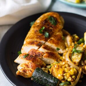 Easy Sheet Pan Mexican Chicken and Vegetables made with fresh corn, zucchini, onion, seasoned to perfection and done in 30 minutes! | www.countrysidecravings.com