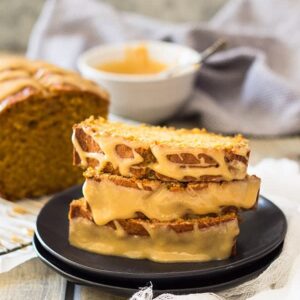 This Pumpkin Bread with Cream Cheese Caramel Icing is super easy to make! It's moist, tender, full of pumpkin and spice. But the best part is the super easy cream cheese caramel icing!! | www.countrysidecravings.com