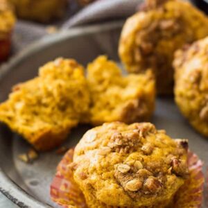 These Pumpkin Steusel Muffins are the perfect fall breakfast or snack! They are perfectly moist, full of pumpkin flavor, spiced perfectly and topped with a crunchy streusel topping! | www.countrysidecravings.com