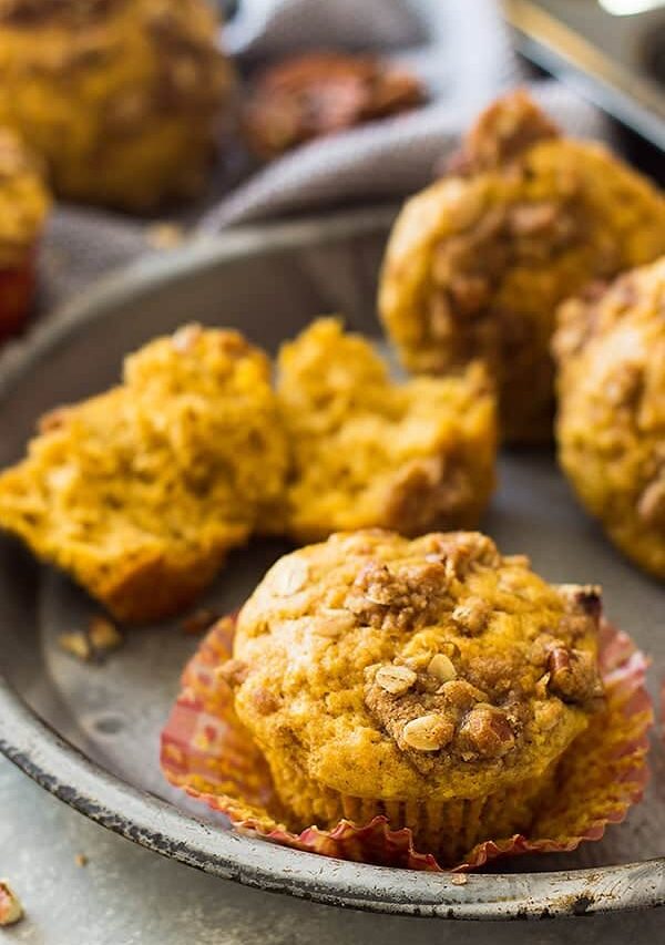 These Pumpkin Steusel Muffins are the perfect fall breakfast or snack! They are perfectly moist, full of pumpkin flavor, spiced perfectly and topped with a crunchy streusel topping! | www.countrysidecravings.com