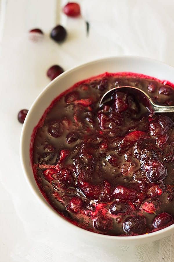 This easy Cranberry Pomegranate Sauce is a simple recipe made in about 15 minutes! | www.countrysidecravings.com