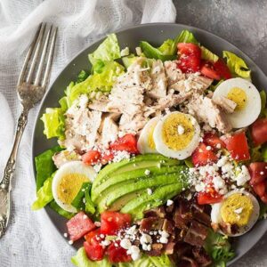 This Turkey Cobb Salad is a great main dish salad to use up some leftover turkey (or you can use chicken too)! It's healthy, full of flavor and will leave you begging for more! | www.countrysidecravings.com