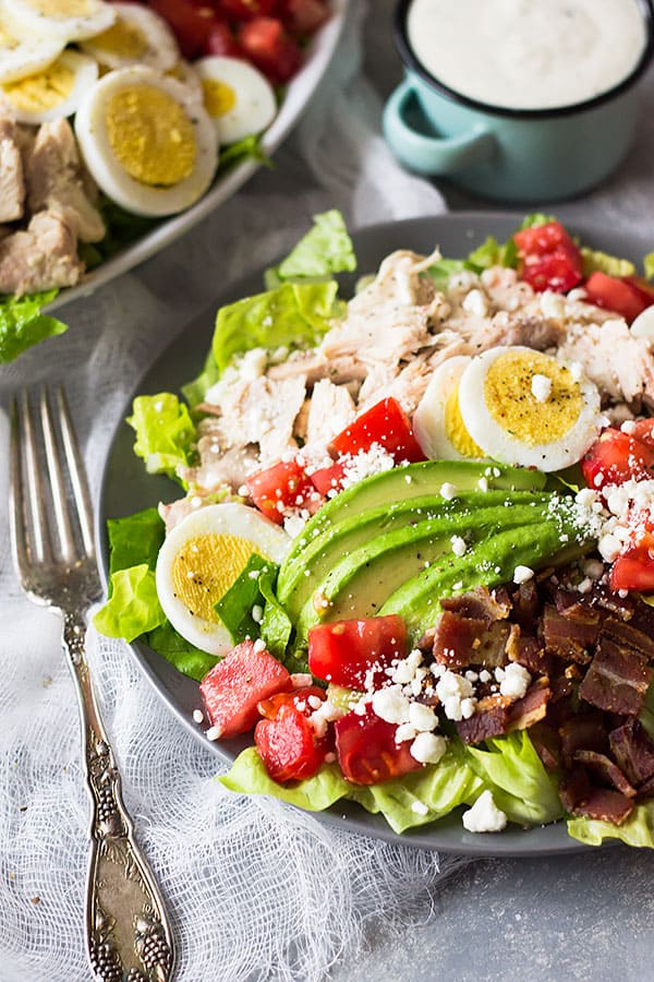 This Turkey Cobb Salad is a great main dish salad to use up some leftover turkey (or you can use chicken too)! It's healthy, full of flavor and will leave you begging for more! | www.countrysidecravings.com