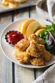 These Baked Homemade Chicken Nuggets are way better than the store bought and you can pronounce everything on these golden nuggets! | www.countrysidecravings.com