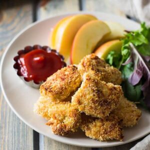 These Baked Homemade Chicken Nuggets are way better than the store bought and you can pronounce everything on these golden nuggets! | www.countrysidecravings.com