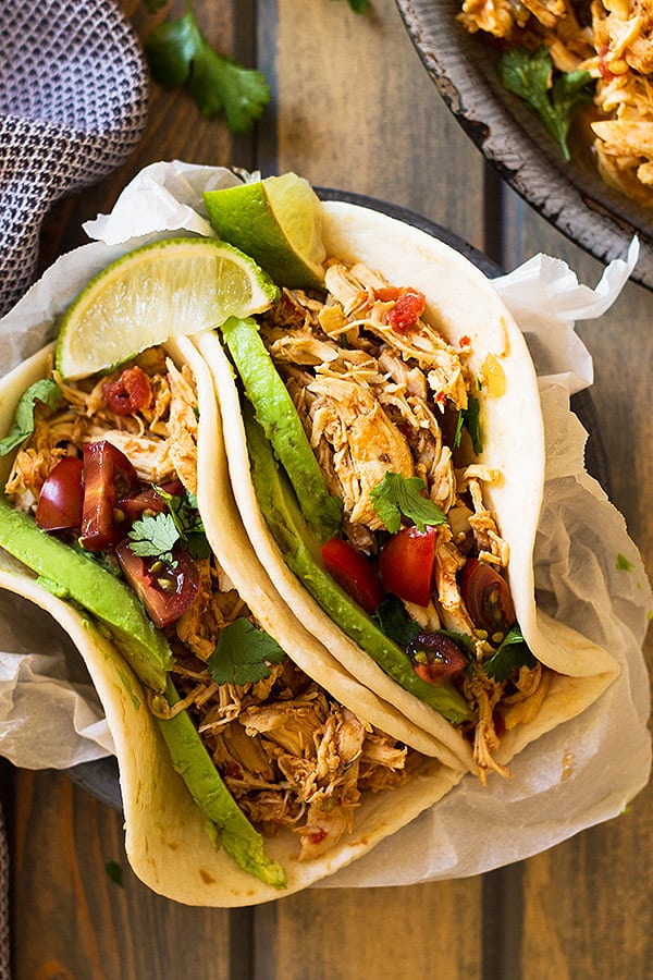 mexican crockpot chicken in taco shells