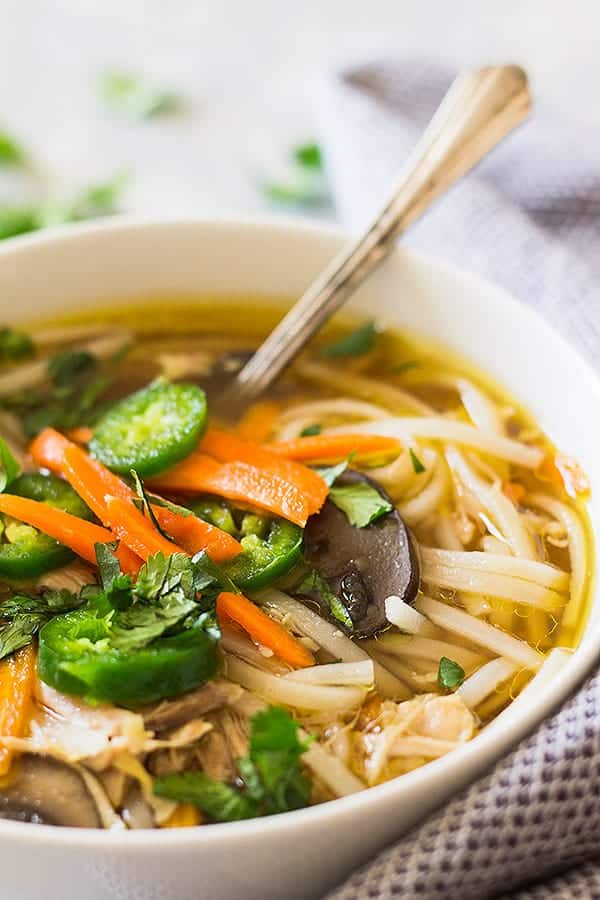 asian soup in a bowl with a spoon