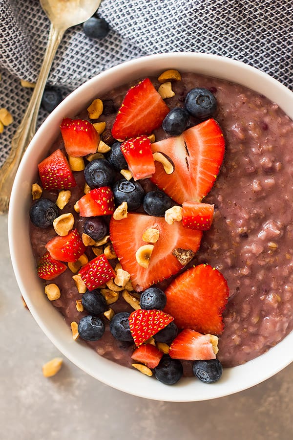 Slow Cooker Berry Oatmeal is a wonderfully hearty breakfast using steel cut oats, frozen mixed berries and your trusty crockpot! | www.countrysidecravings.com