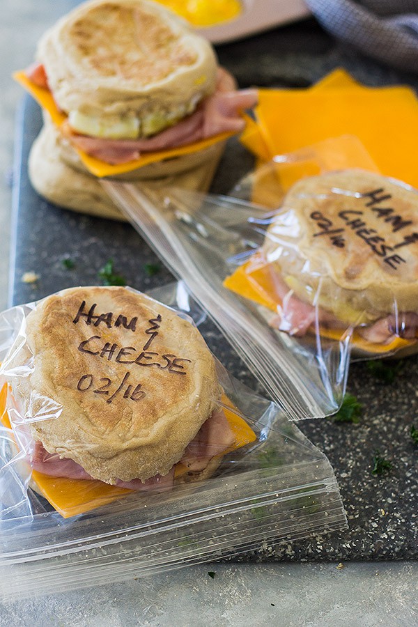 This Freezer Breakfast Ham Egg and Cheese sandwich is a healthier alternative to that Egg McMuffin! They are easy to make and are a great for breakfast on the go! | www.countrysidecravings.com
