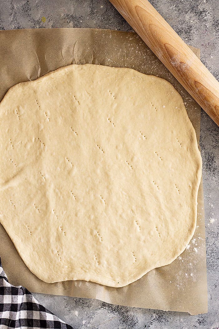 Pizza dough rolled out ready for toppings!