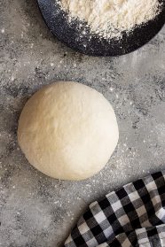 A ball of dough ready to roll into a crust.